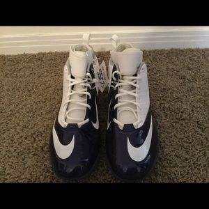 New with tags size 18 Nike cleats